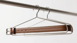 Belt rack vs looped hanger bar which saves leather belts.jpg