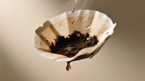 Use a coffee filter to save coffee grounds before they clog drains or spoil.jpg